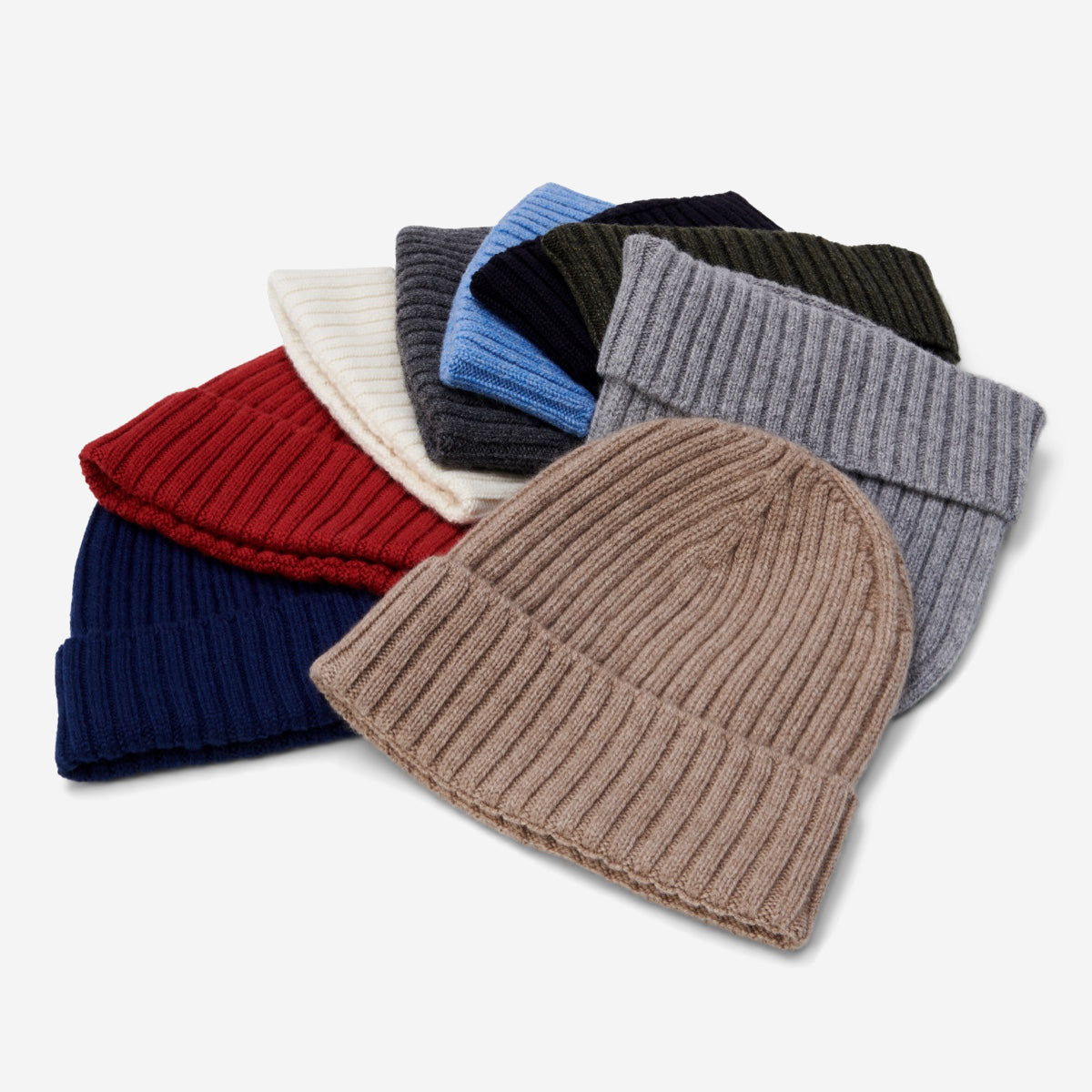Light blue ribbed beanie among mixed-color knit beanies