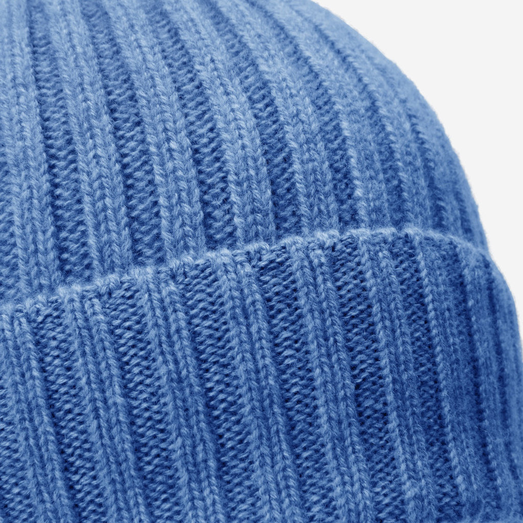 Light blue ribbed knit beanie texture with folded cuff