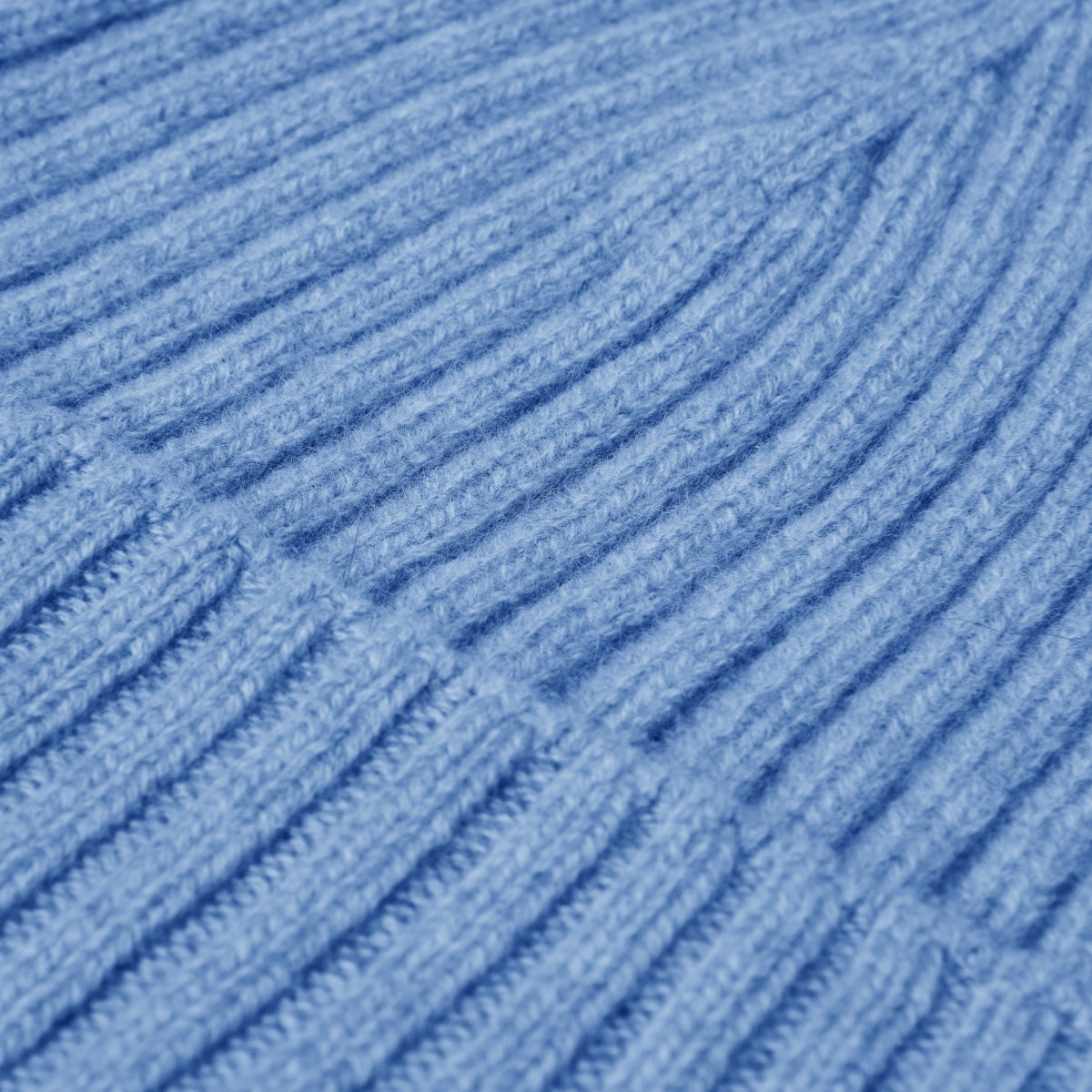 Light blue ribbed knit beanie fabric with vertical knit stripes