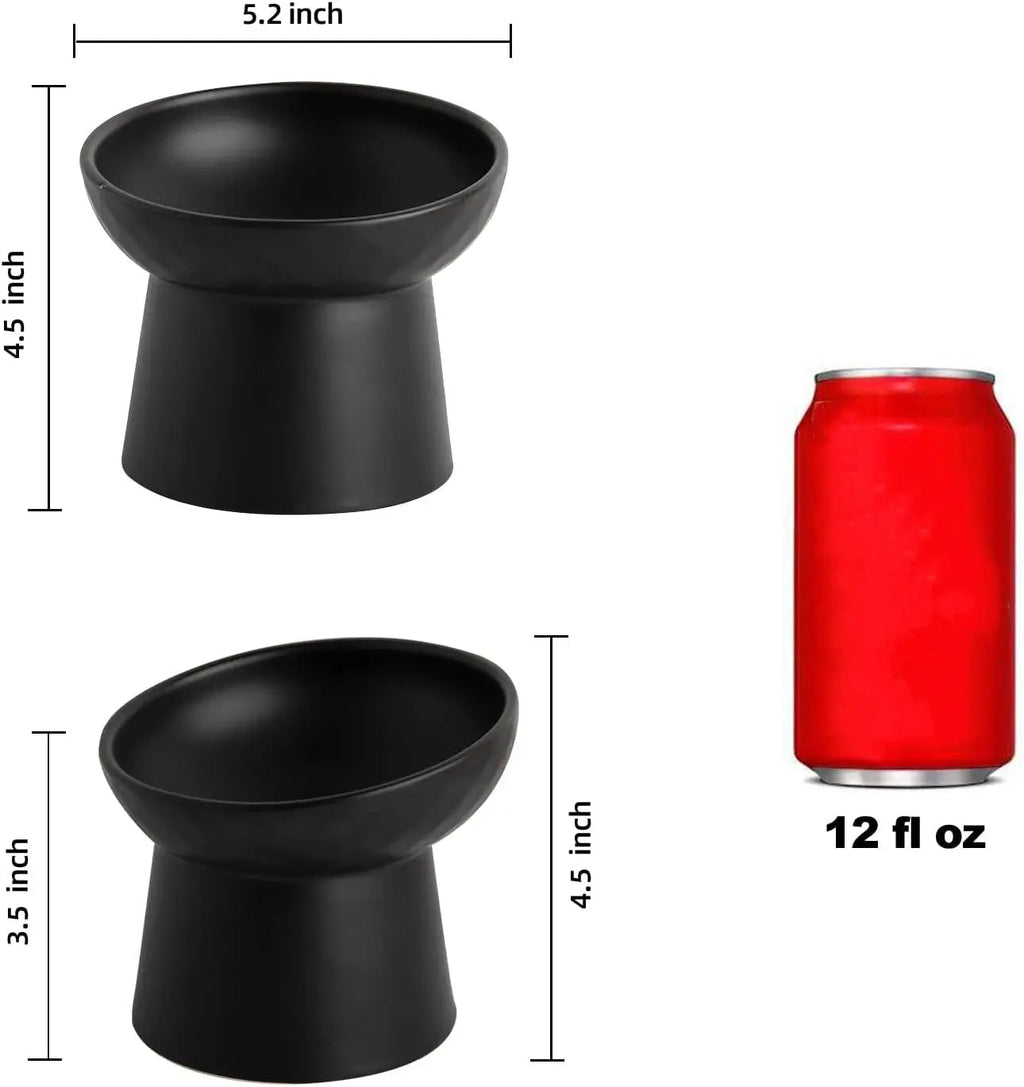Pair of raised tilted black ceramic cat bowls, 4.5 in height, 5.2 in width