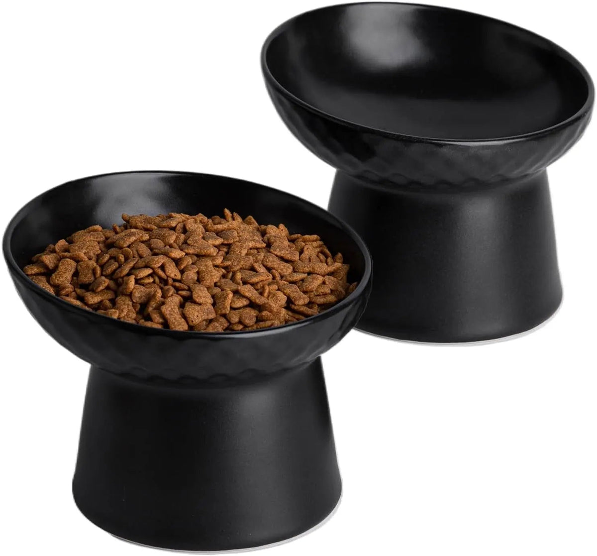Pair of black raised tilted ceramic cat bowls with kibble-filled dishes