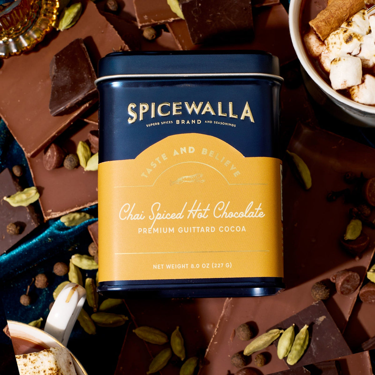 Spicewalla chai spiced hot chocolate mix tin, navy lid and orange front label