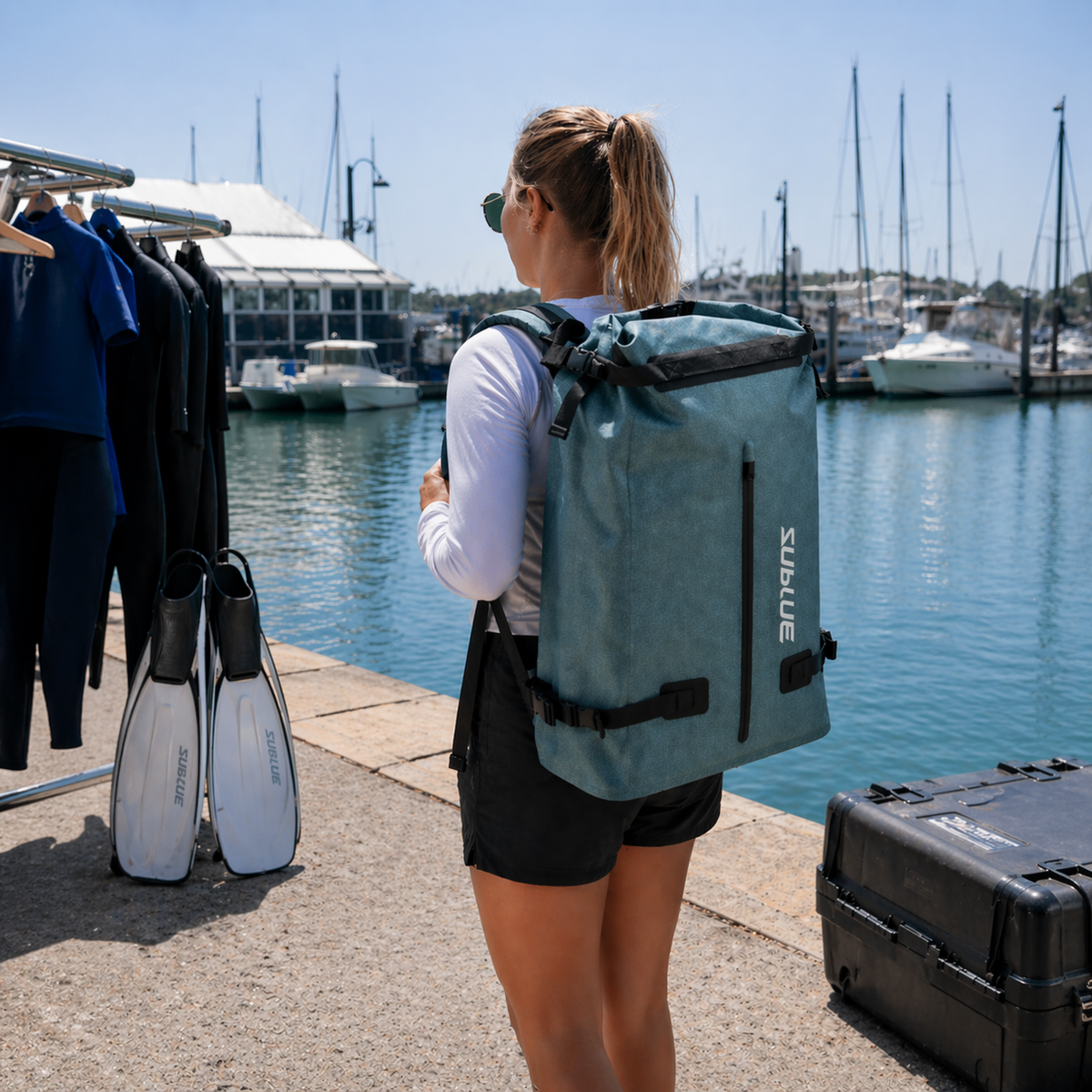 52L waterproof backpack worn on back with padded shoulder straps and side buckle pockets