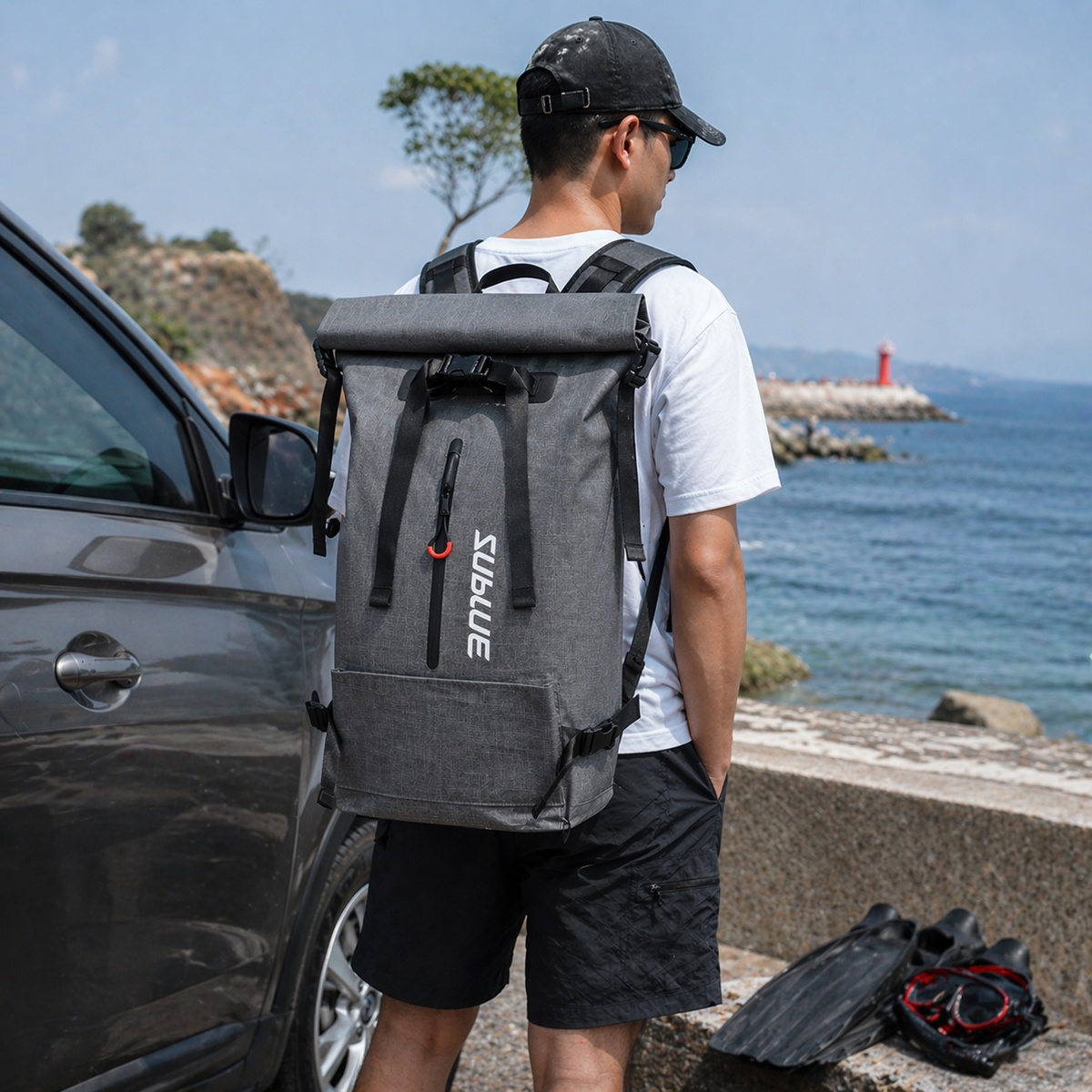 Waterproof backpack 30L, dark gray with top flap, front buckles, and shoulder straps