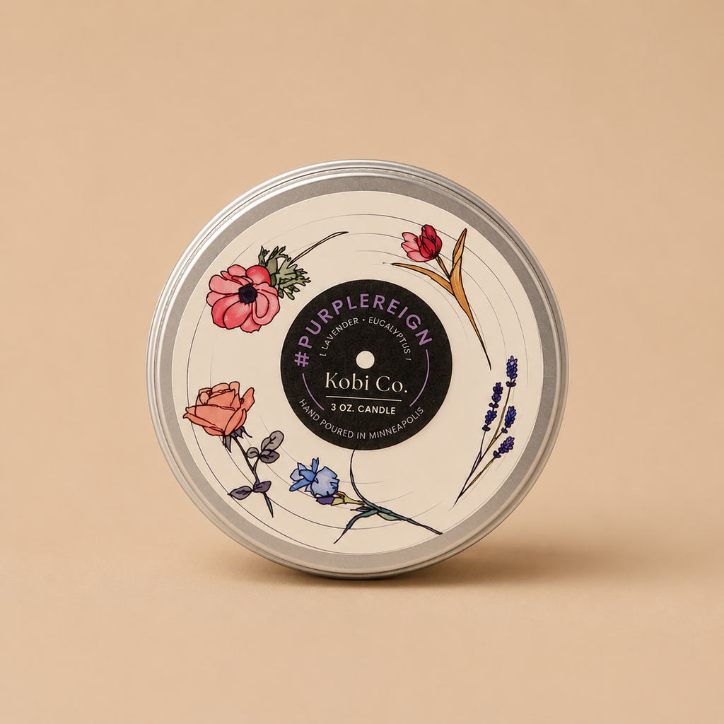 Travel tin candle with floral lid and Kobi Co label, round silver tin