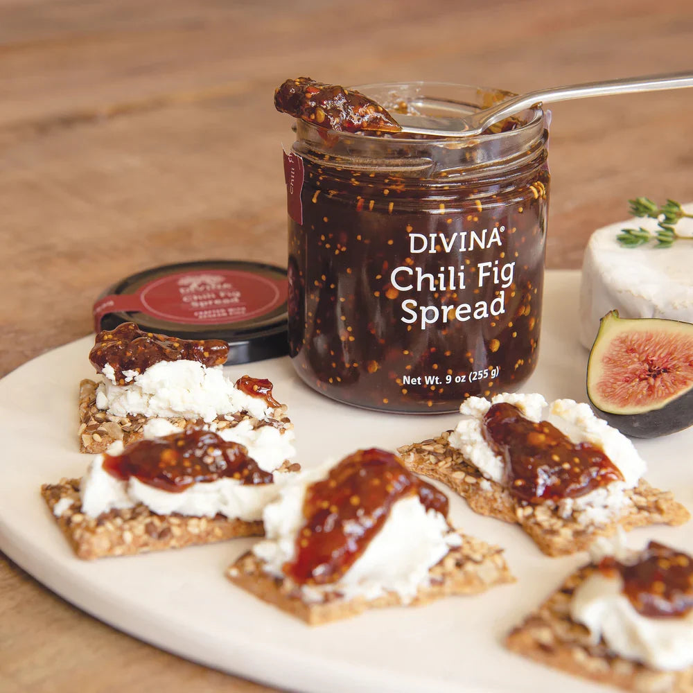 DiVina chili fig spread jar with crackers and white cheese