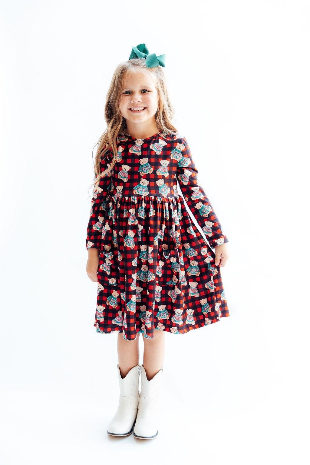 Girls' long-sleeve twirl dress in red-and-blue plaid with bear prints, full skirt