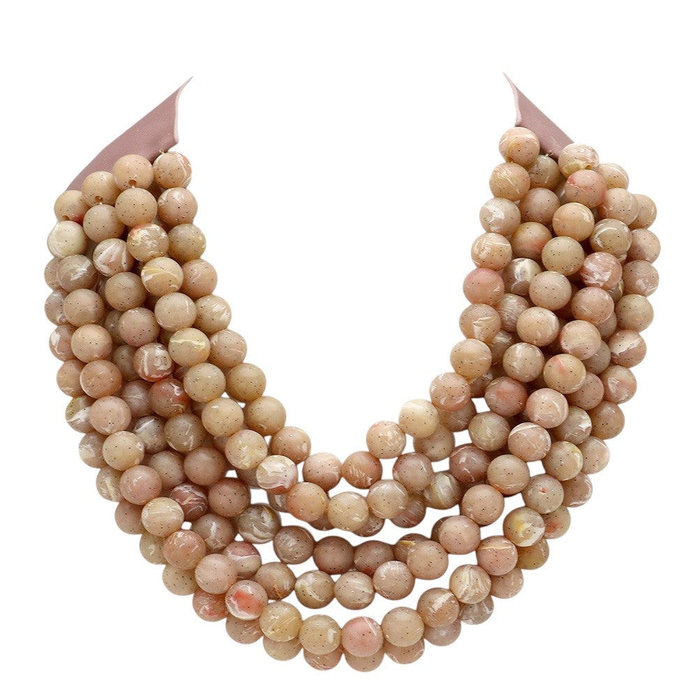 Chunky multi-strand beaded statement necklace in blush-toned round beads
