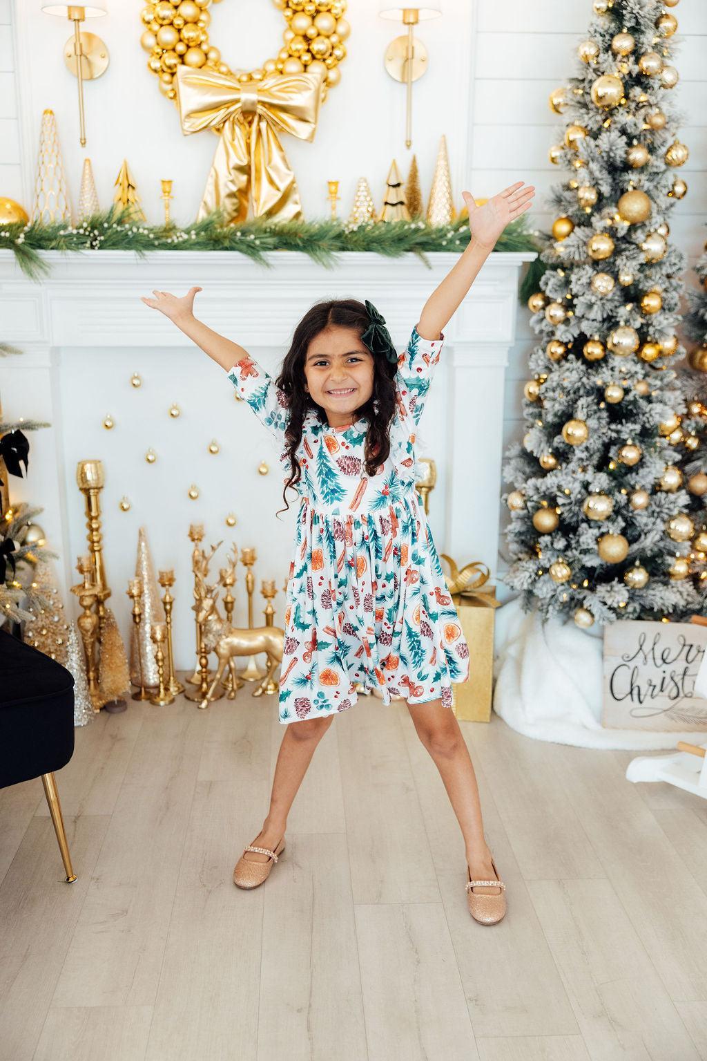 Kids Christmas print twirl dress with bow detail, 3/4 puff sleeves and twirly skirt