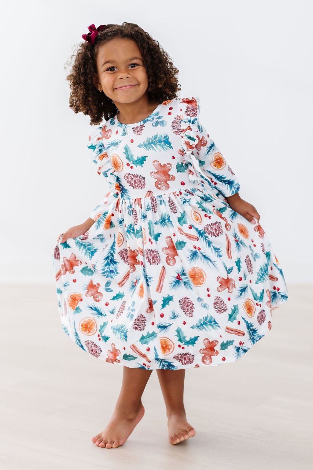 Kids Christmas print twirl dress with ruffled neckline and 3/4 sleeves, flared hem