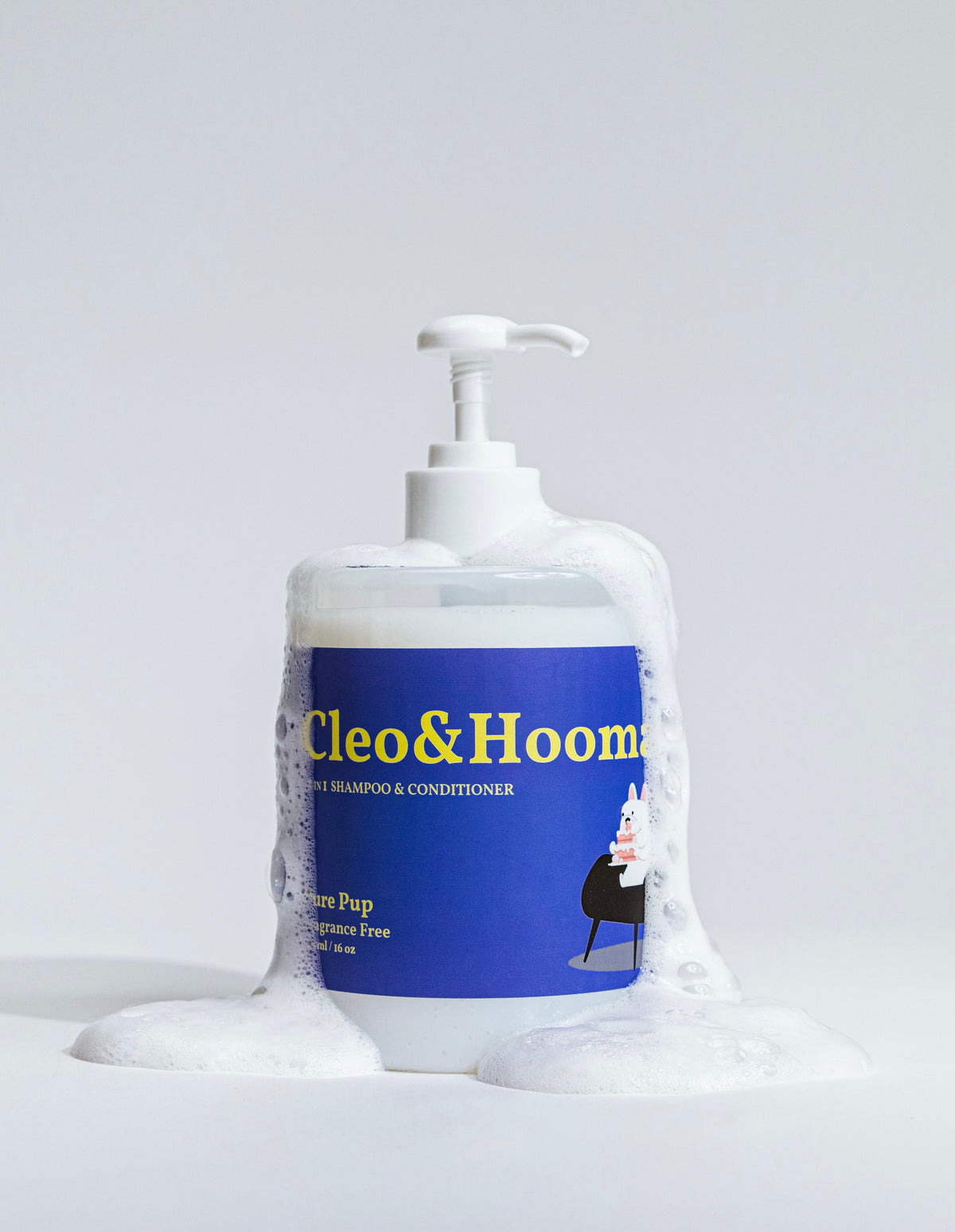 Dog shampoo and conditioner pump bottle with blue label and white foam