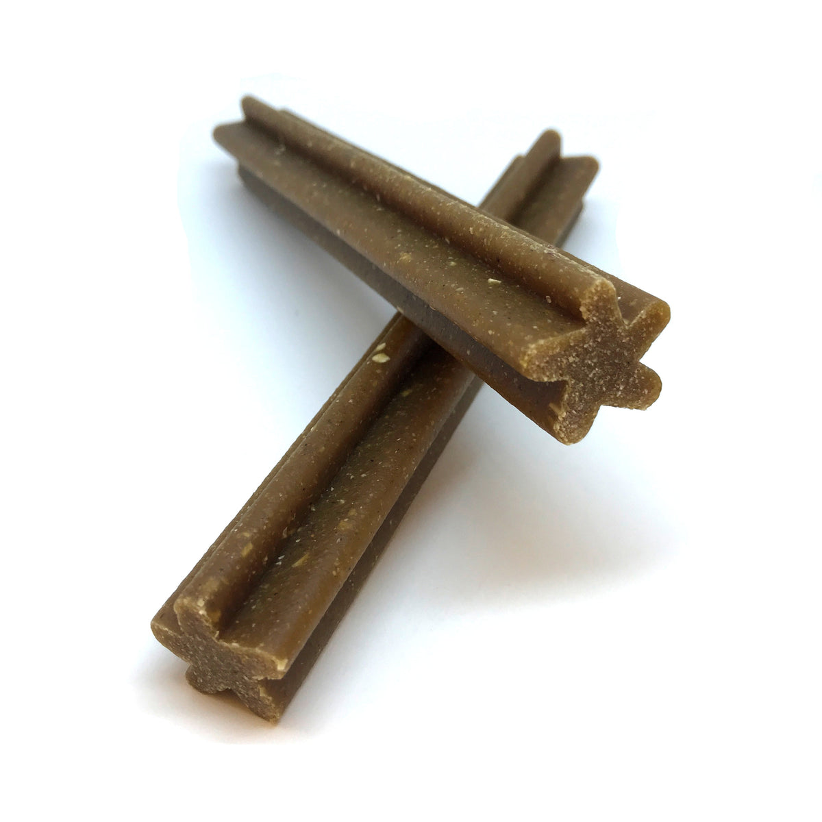 Brown dog chew sticks, two bars with textured surface