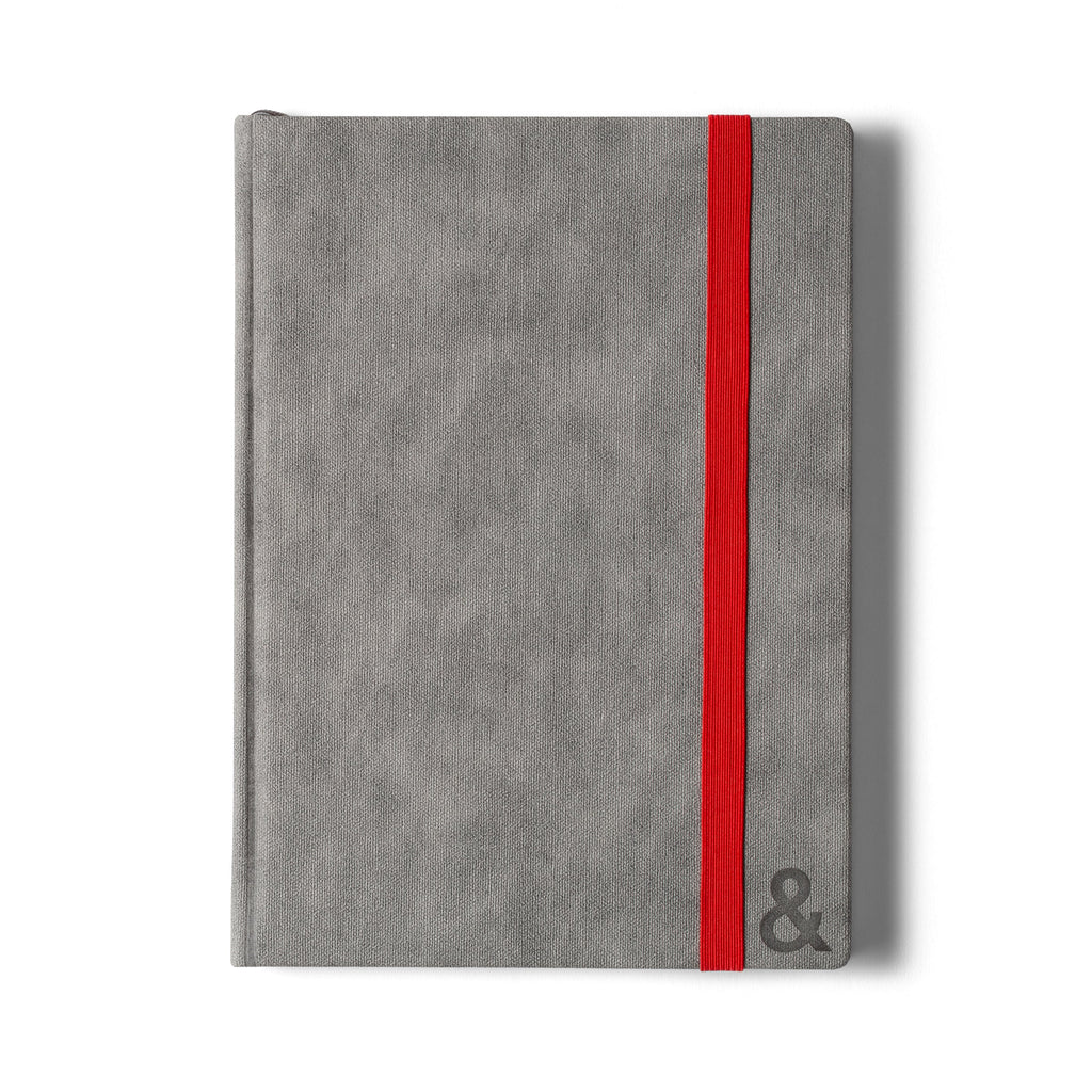 Gray habit system planner with red vertical ribbon bookmark on front cover