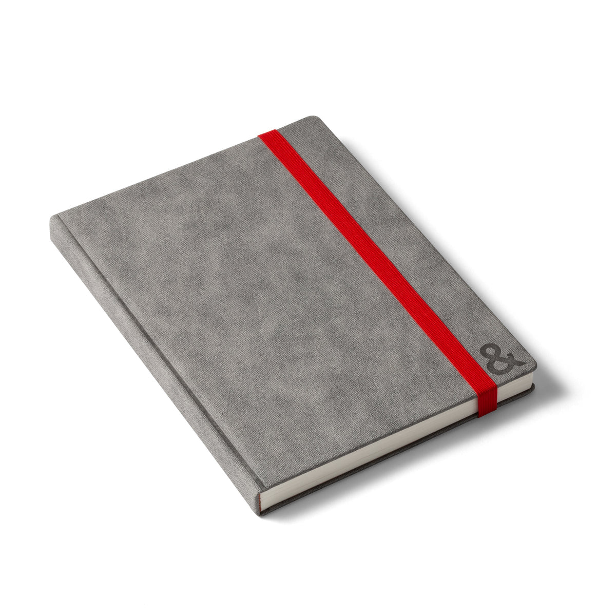 Gray habit system planner with red ribbon strip and embossed ampersand on side