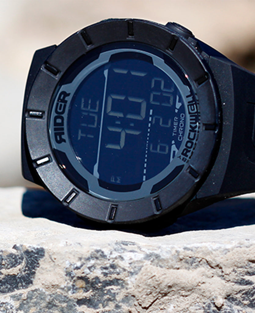 Navy-blue digital sport watch with multi-function display and rugged bezel