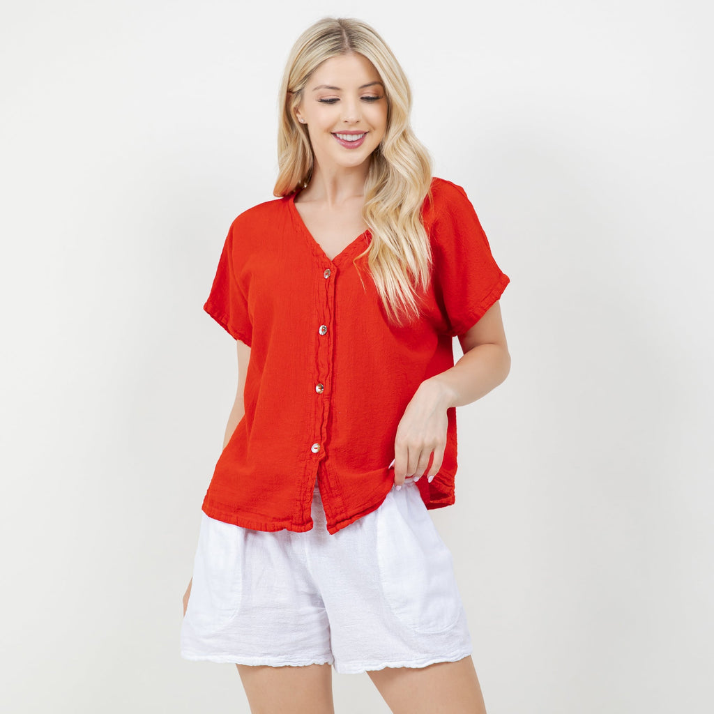 Red cotton gauze blouse with V-neck, short sleeves, and front buttons
