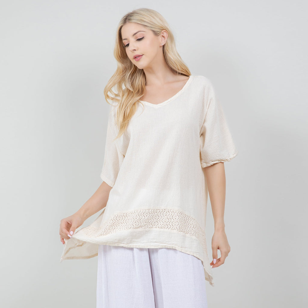 Ivory cotton gauze Cynthia top with scoop neck, puff sleeves, and embroidered hem panel