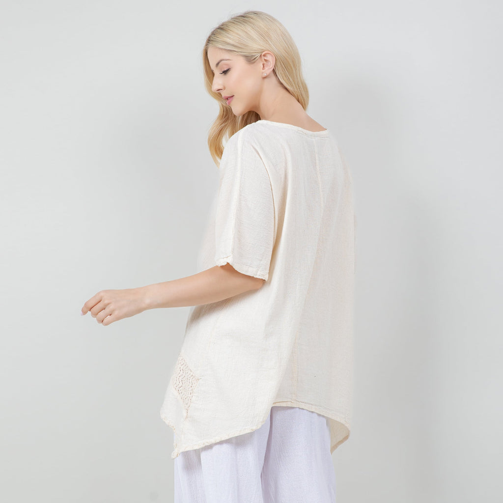 White cotton gauze Cynthia top in back view with scoop back and short puff sleeves