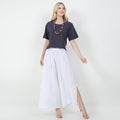 Women's gauze Heidi top, dark navy, crew neck, short sleeves; bead necklace visible