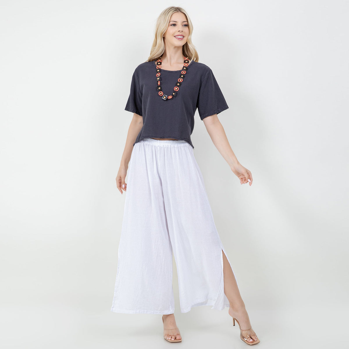 Women's gauze Heidi top, dark navy, crew neck, short sleeves; bead necklace visible