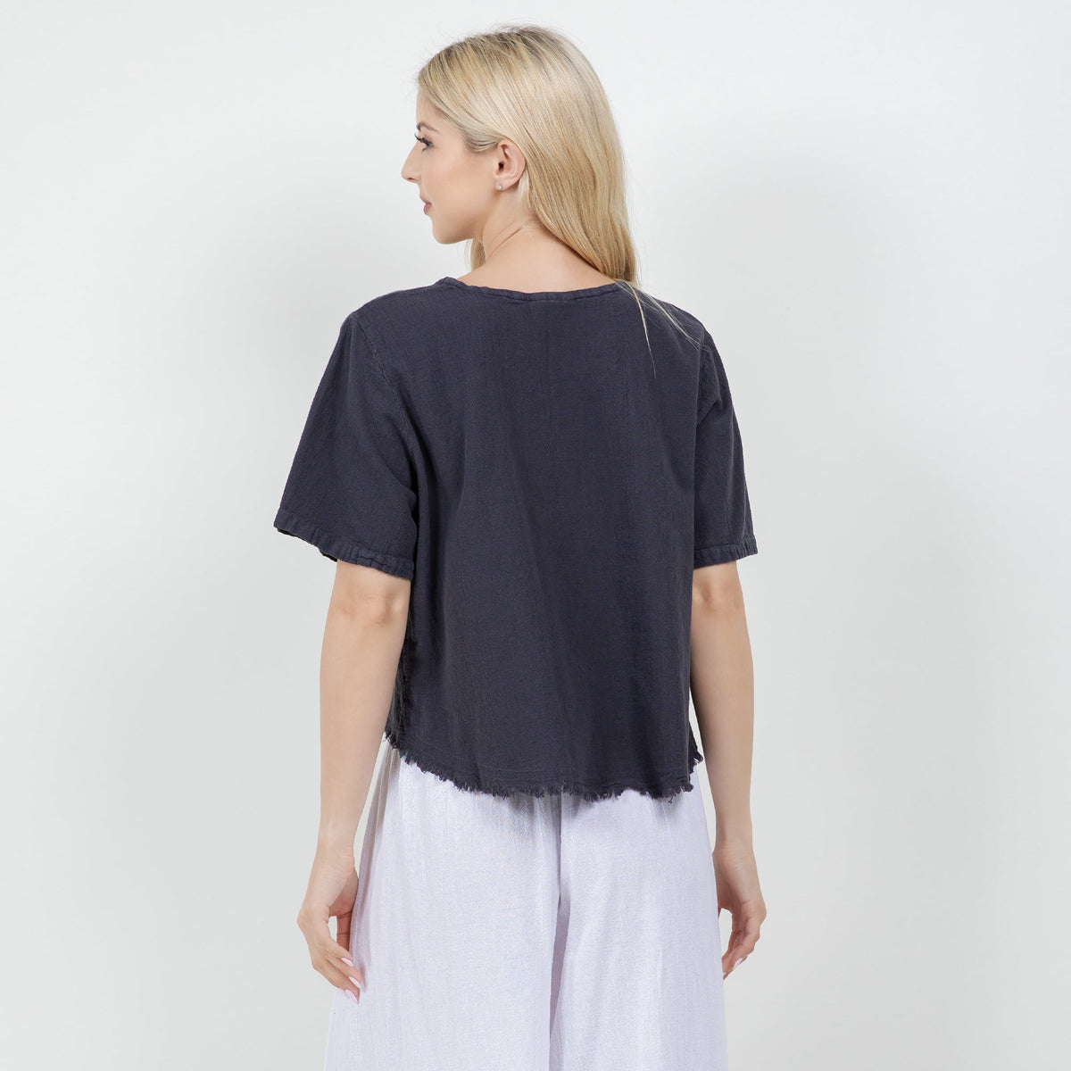 Women's gauze Heidi top, dark navy, back view, short sleeves and raw hem