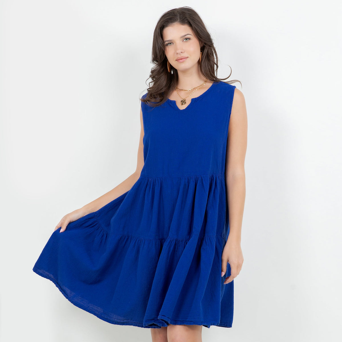 Blue cotton gauze tiered sleeveless dress with flared skirt