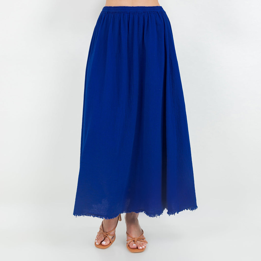 Blue cotton gauze midi skirt with elastic waistband and frayed uneven hem