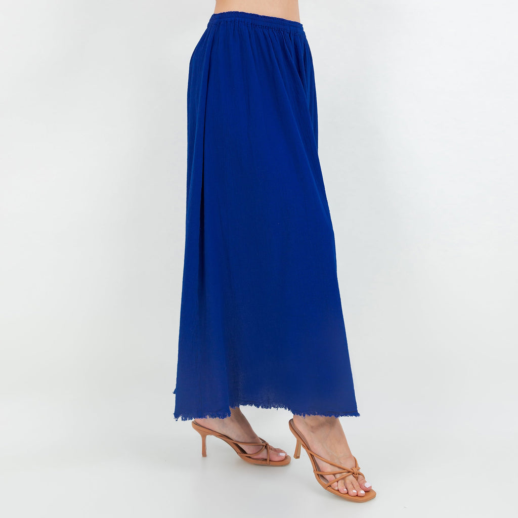 Blue cotton gauze midi skirt with elastic waistband and frayed uneven hem