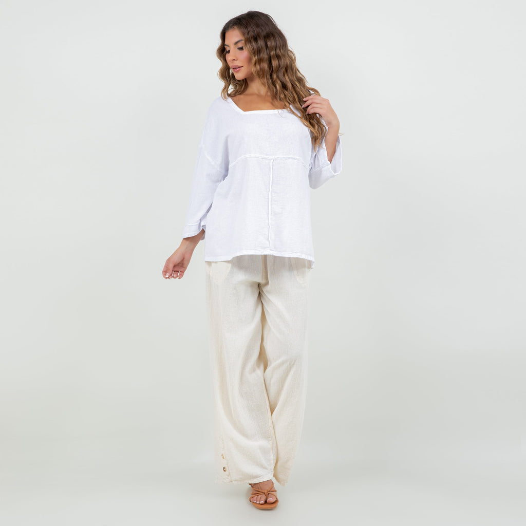 White cotton gauze peasant top with square neckline, loose silhouette, 3/4 sleeves