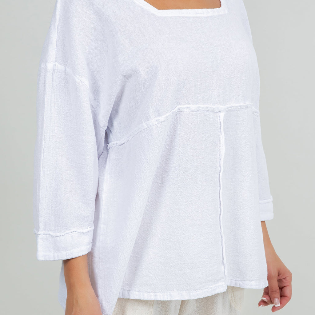 White cotton gauze peasant top with square neckline, 3/4 sleeves, front yoke seams