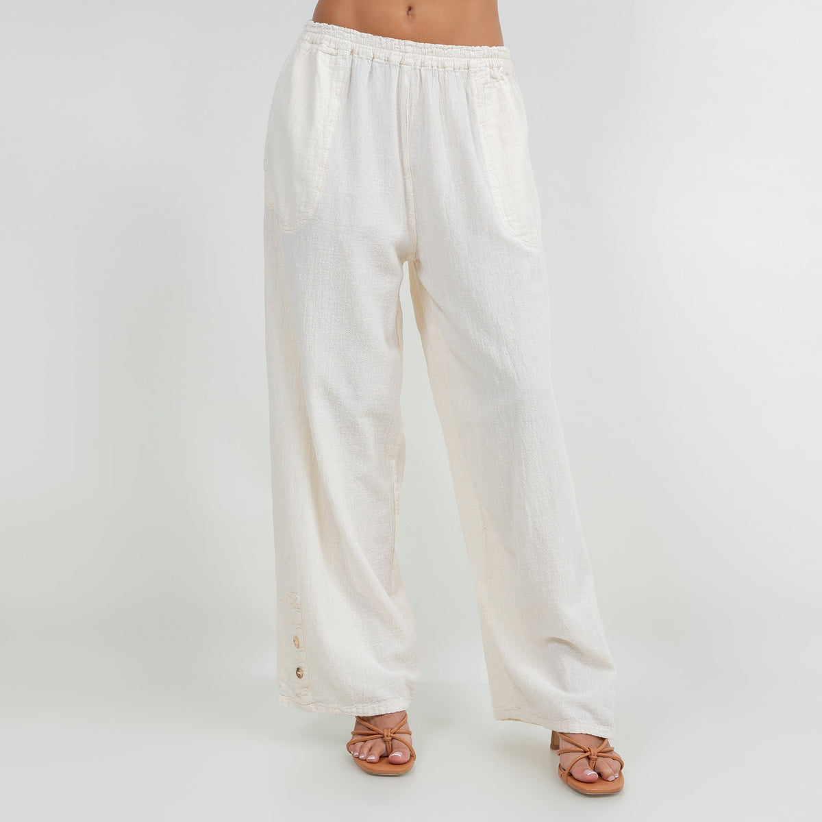 Ivory cotton gauze pull-on wide-leg pants with elastic waist and relaxed fit