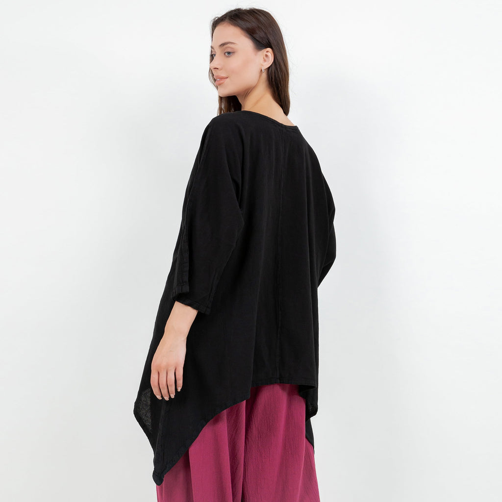 Women's cotton gauze top, black, side view with flowing drape and asymmetrical hem