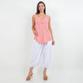 White 100% cotton gauze cropped pants with elastic waist and gathered hem