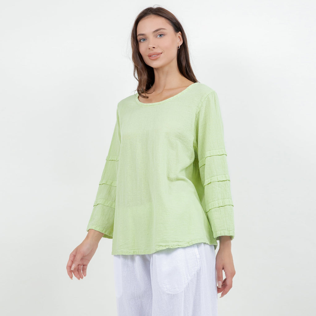 Pastel green cotton gauze sabrina top with relaxed silhouette and tiered sleeves