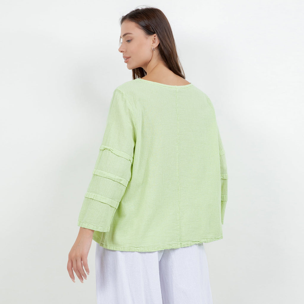 Lime green cotton gauze sabrina top back view with three-quarter, banded elastic cuffs