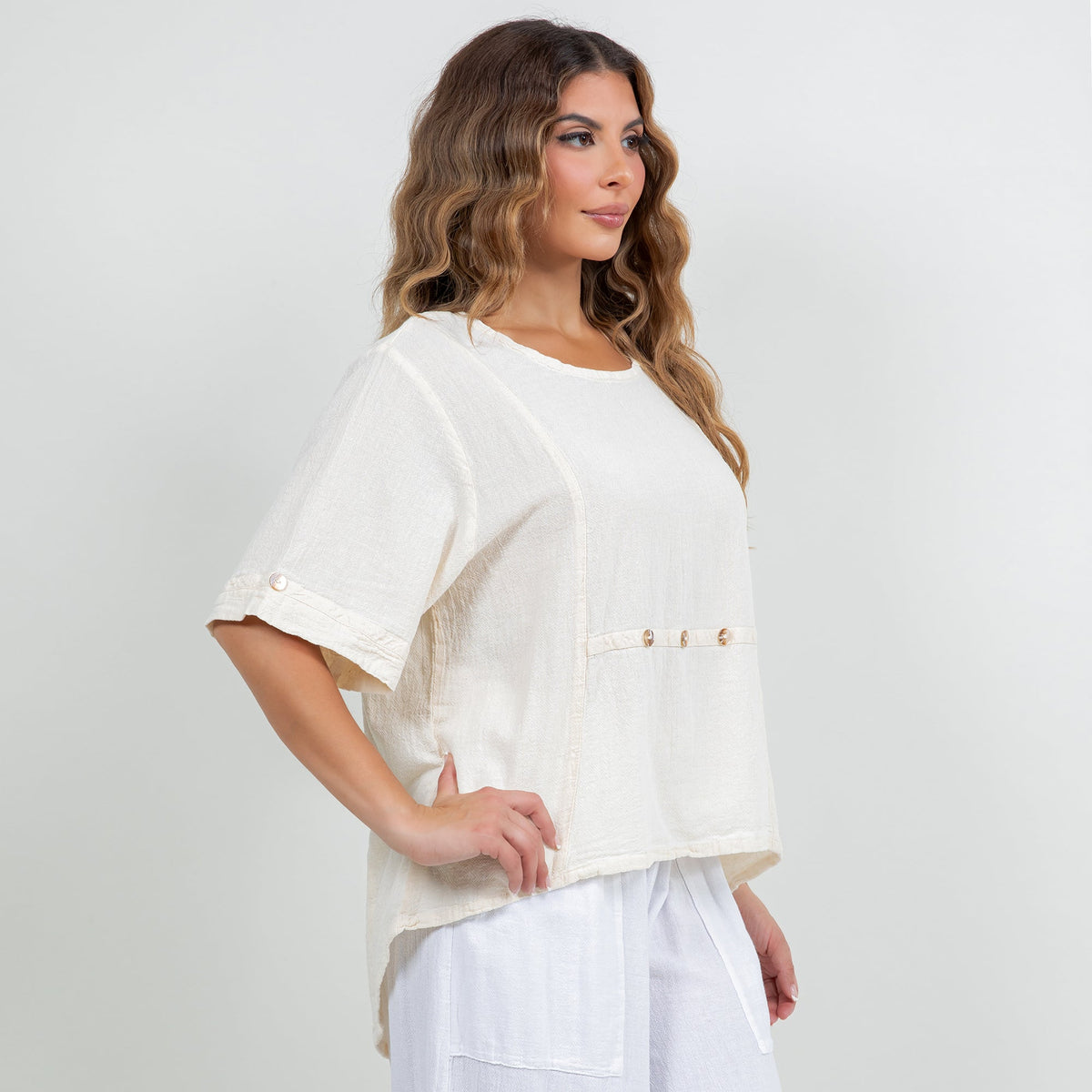 Women’s cotton gauze Kira top in white, short sleeves, button-trim front panel, side view