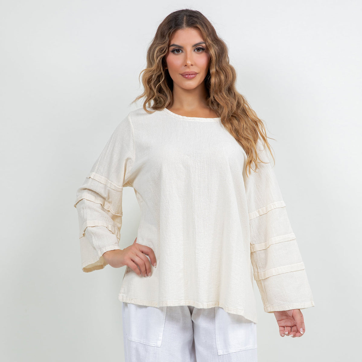 Off-white cotton gauze sabrina top with bateau neckline and tiered 3/4 sleeves
