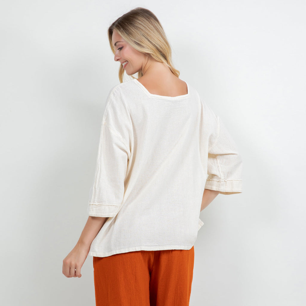 White cotton gauze back of tunic top with three-quarter sleeves