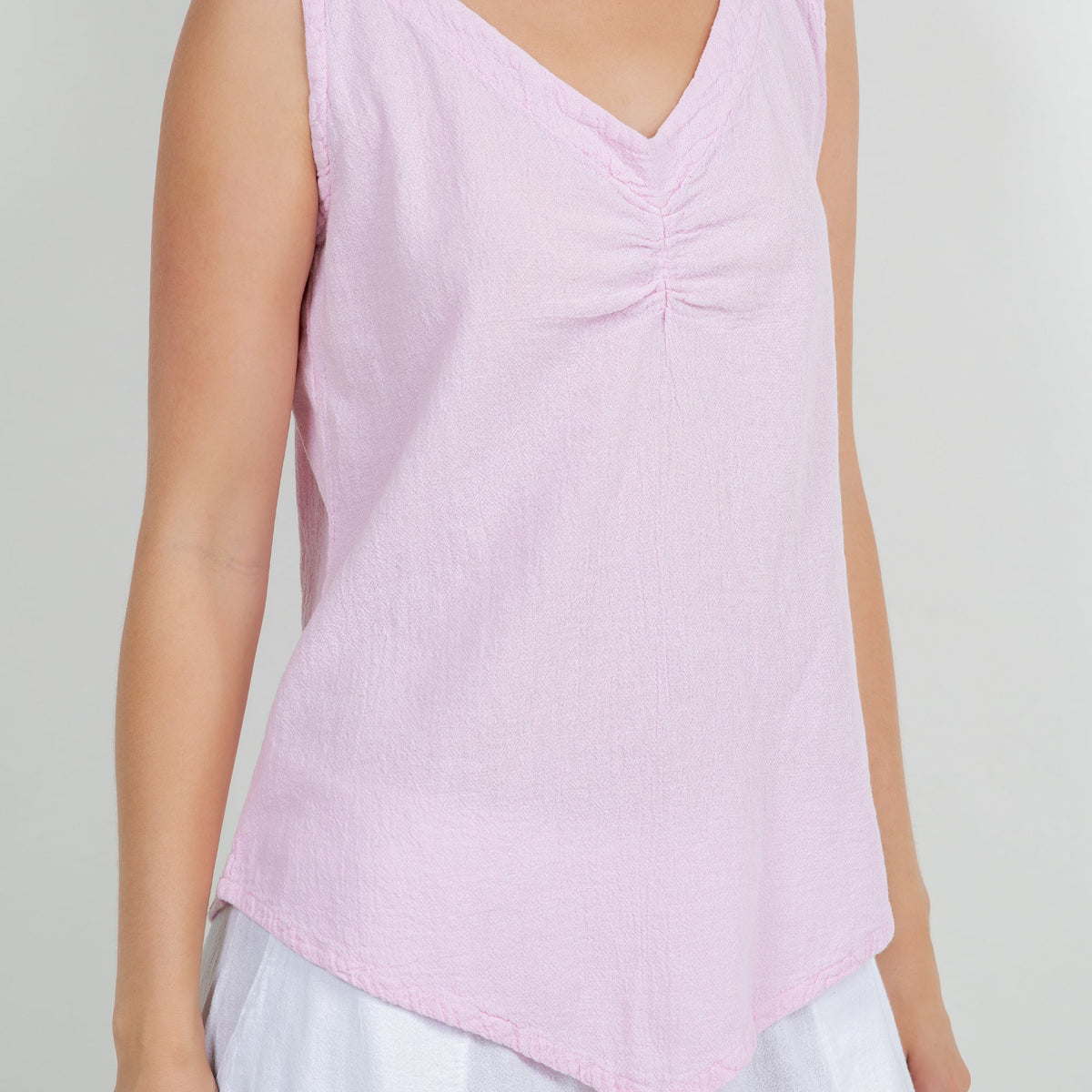 Women’s cotton gauze tank top close-up, lilac V-neck with ruched center seam