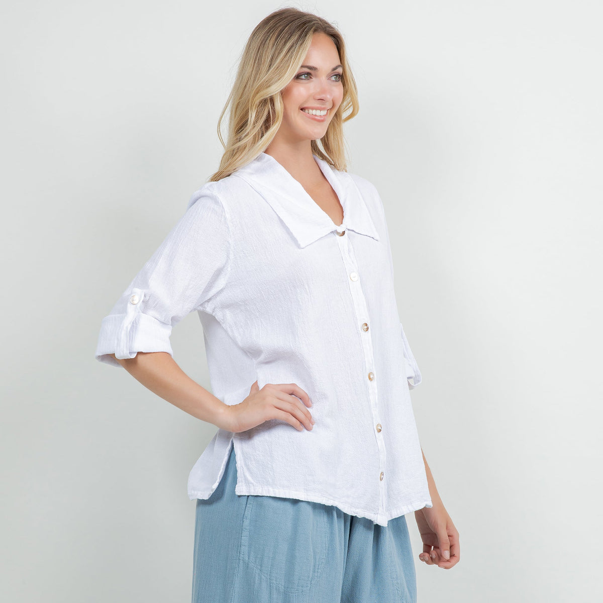 White cotton gauze button-up shirt with point collar, partial button closure