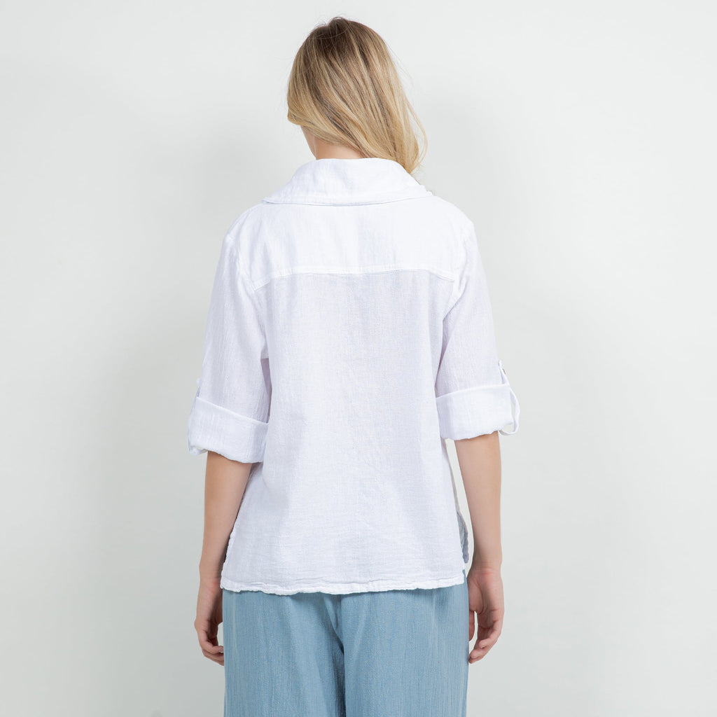 White cotton gauze button-up shirt back view with folded sleeves