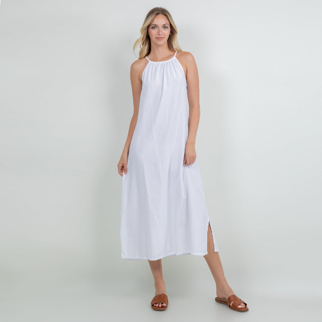 White cotton gauze halter midi dress with gathered neckline and side slit.