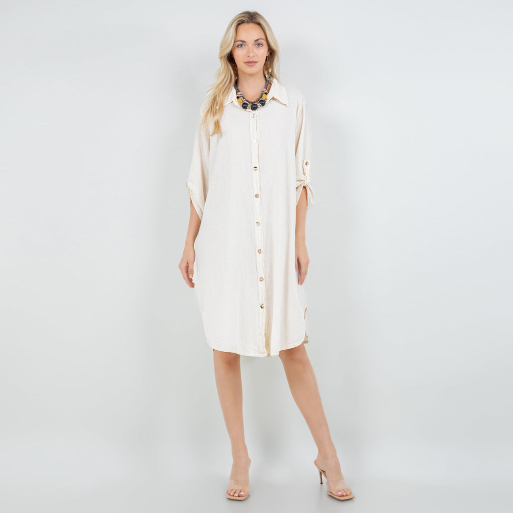 Ivory cotton gauze tunic with collar, button-front placket, and side-slit hem