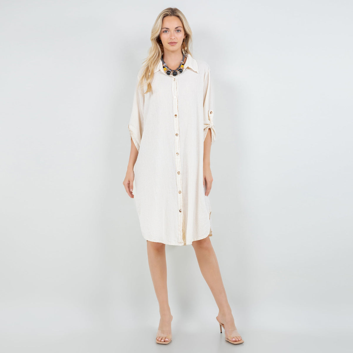Ivory cotton gauze tunic with collar, button-front placket, and side-slit hem