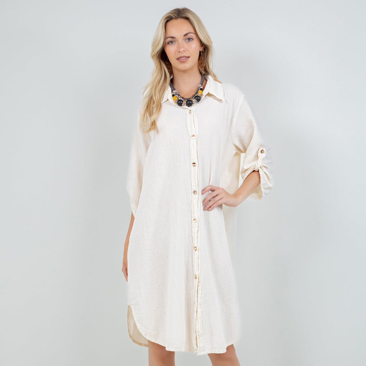 Ivory cotton gauze tunic with collar and button-front, gathered cuff sleeve ties