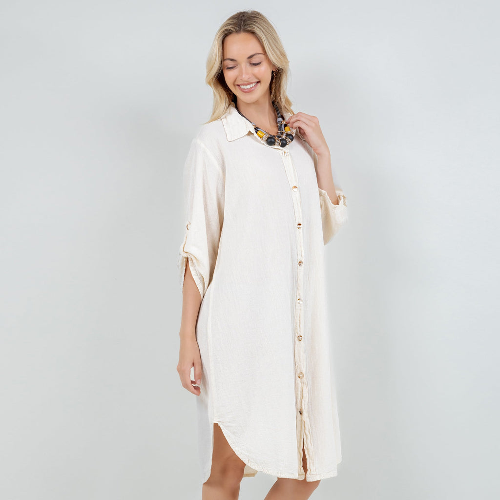 Ivory cotton gauze tunic with collar and vertical button placket, side slit hem