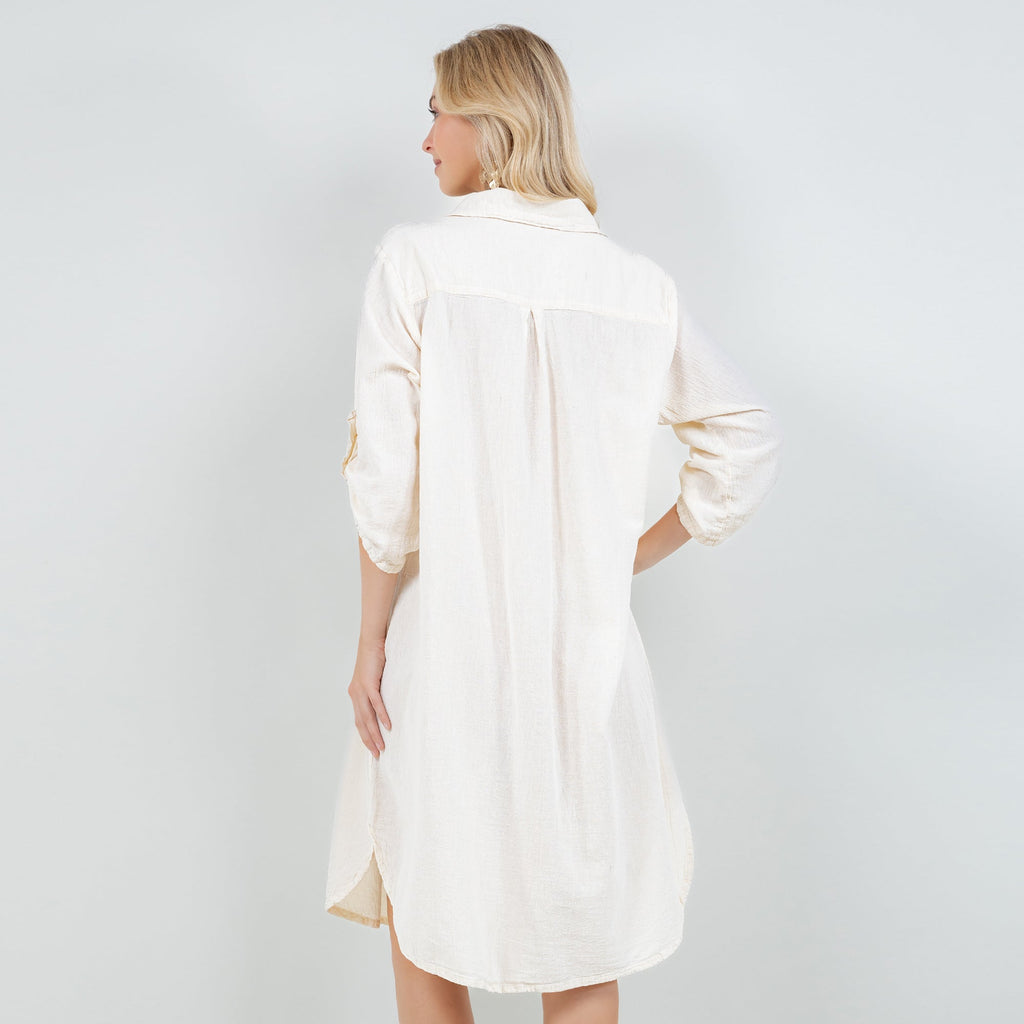 Ivory cotton gauze tunic shown from back with collar and side-slit hem