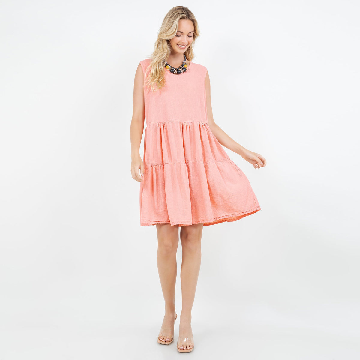 Peach pink cotton gauze tiered sleeveless dress with round neckline