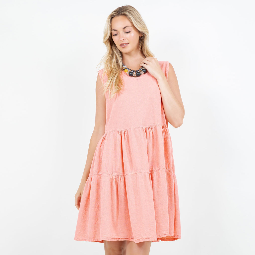 Peach pink cotton gauze tiered sleeveless dress with flared skirt