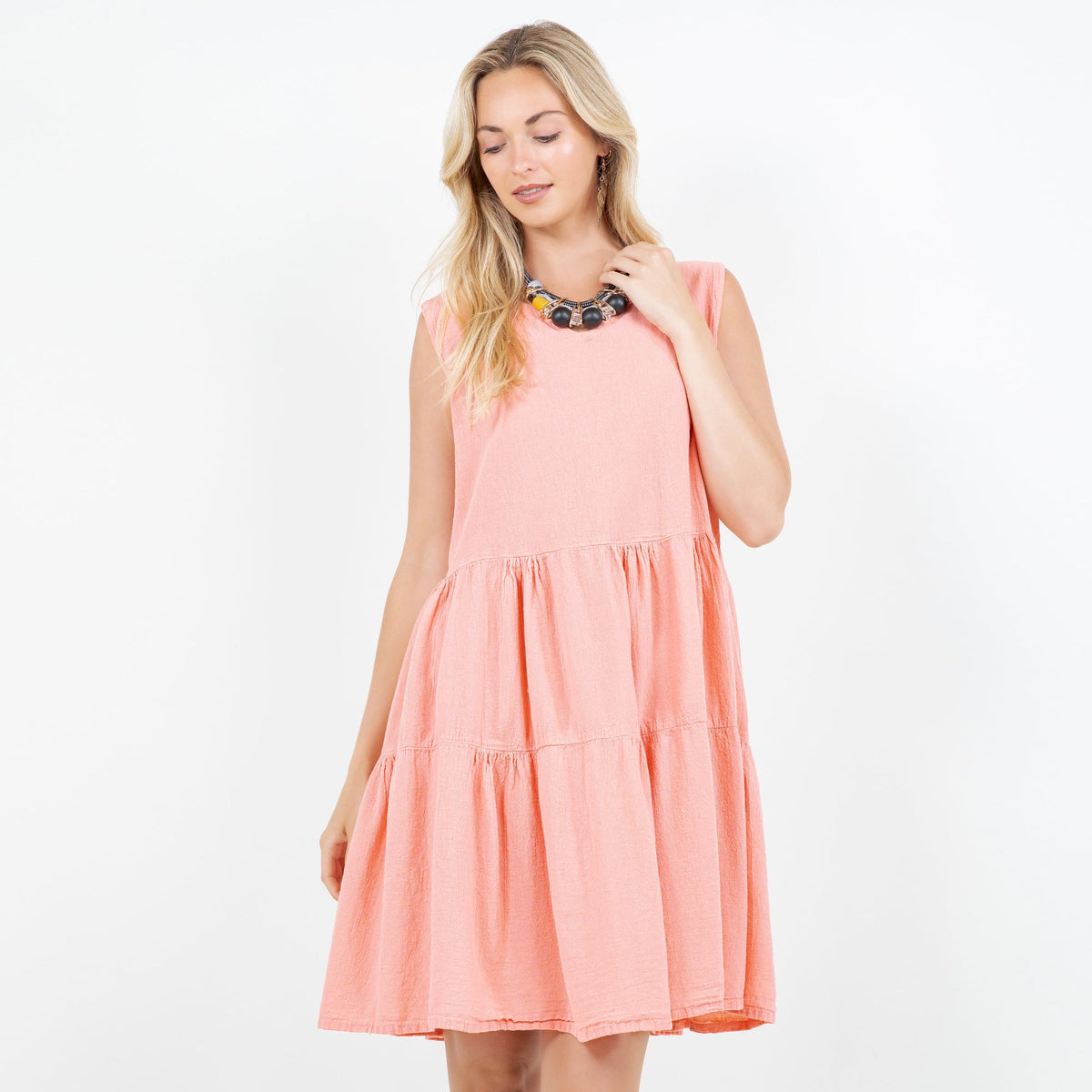 Peach pink cotton gauze tiered sleeveless dress with flared skirt
